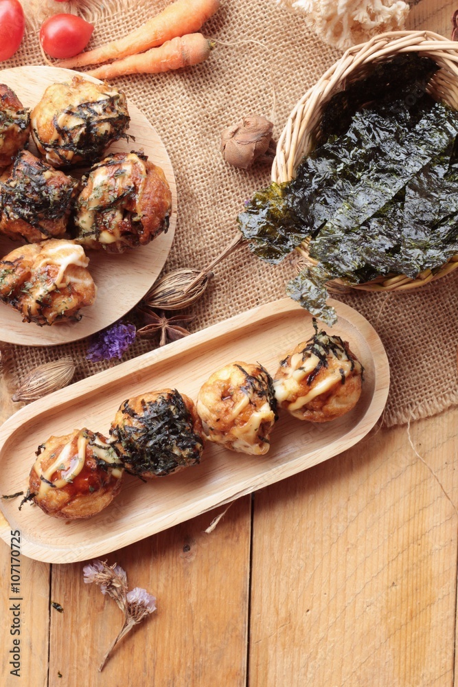 Takoyaki fried balls with sauce ,tradinition japanese food. Takoyaki fried balls with sauce ,tradinition japanese food.