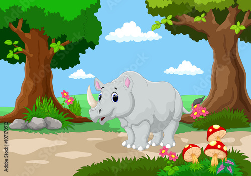 Funny rhino with a background of a beautiful garden