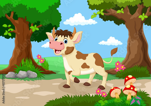 Funny cow with a background of a beautiful garden