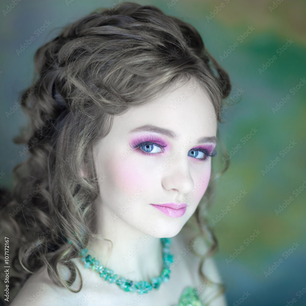 Little girl with beautiful makeup. Little girl in a vintage dress. portrait of a little princess Little girl with beautiful makeup. Little girl in a vintage dress. portrait of a little princess