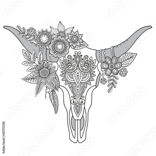 Decorative Indian bull skull with ethnic ornament, flowers and l