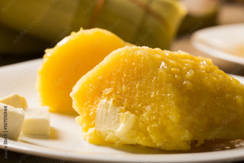 Pamonha with cheese - typical food of green corn - tasty and che Pamonha with cheese - typical food of green corn - tasty and che