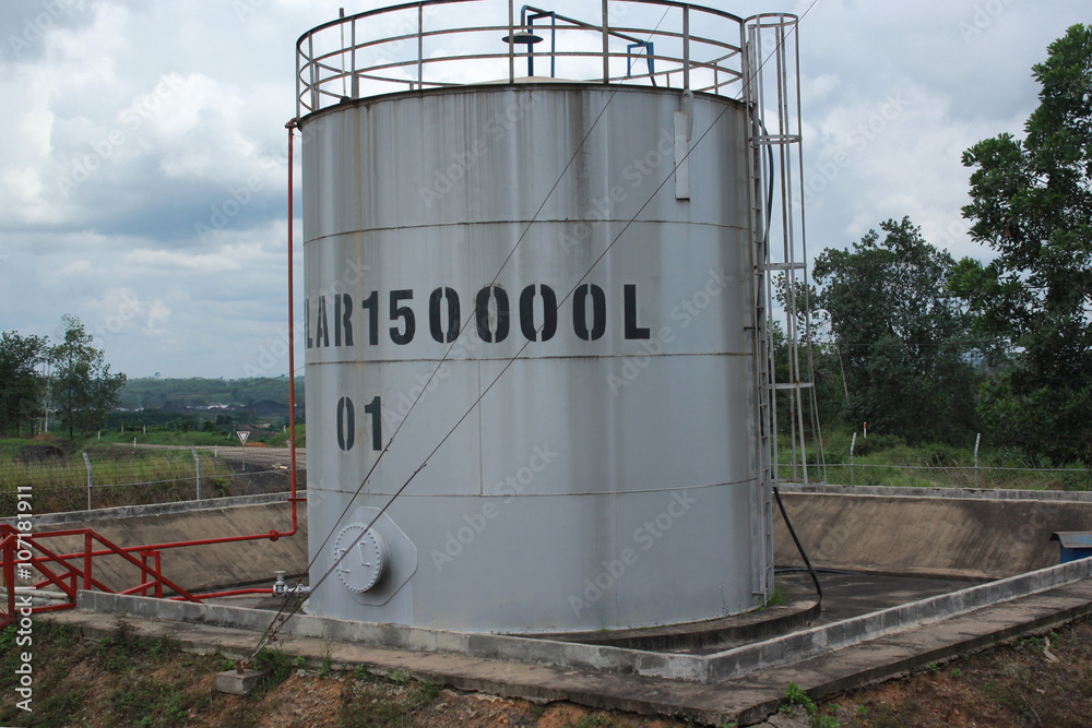 Obraz premium Large white tanks for diesel fuel