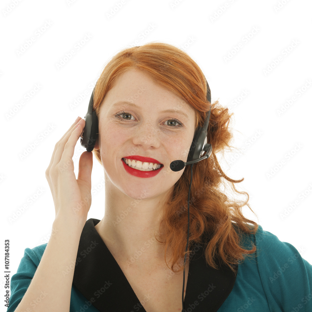 Young red haired woman with head set Young red haired woman with head set