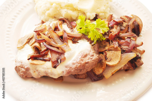 Cube Steaks Served with Cheese, Mushrooms & Red Onion