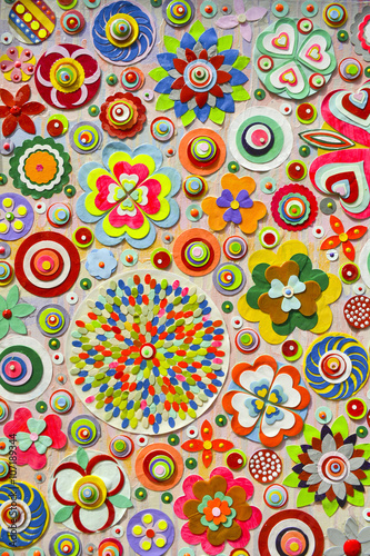 Abstract background of flowers. Close-up.Zentangle like decorative circular floral elements, made of paper 