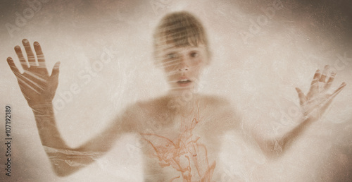 Slika na platnu One frightened boy behind clear textured film