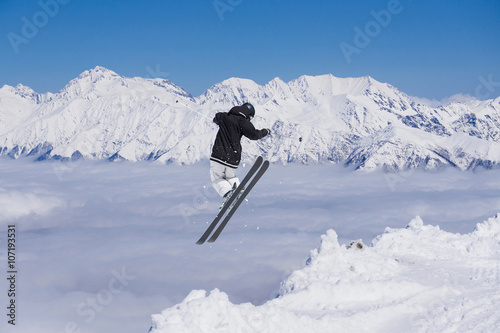 Flying skier on mountains. Extreme sport. © Vasily Merkushev