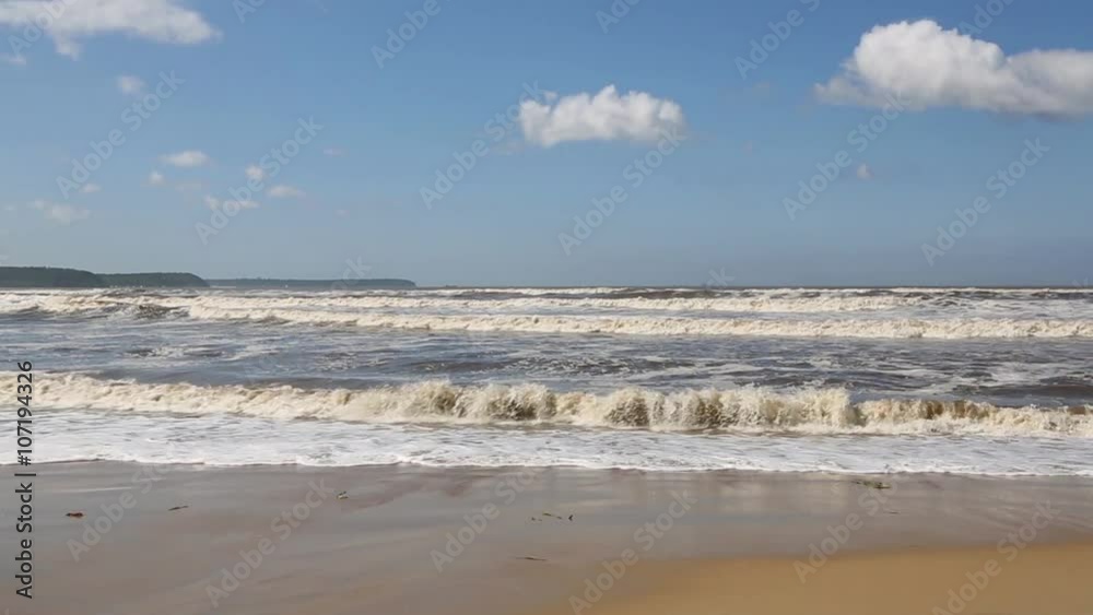 Sea waves hitting the beach after a storm. Sea of Japan, Russia. Sea waves hitting the beach after a storm. Sea of Japan, Russia.