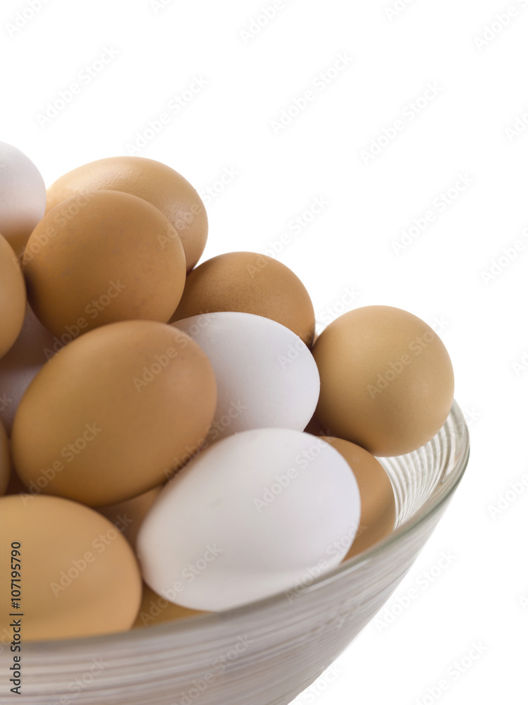 close up image of white and brown eggs close up image of white and brown eggs