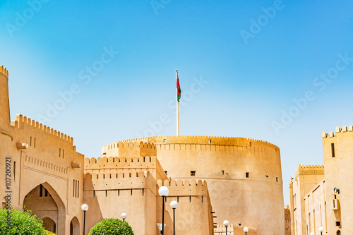 Nizwa Fort in Nizwa, Oman. It was built in 1650s. Nizwa was the capital of Oman proper and is located about 140 km from Muscat. photo