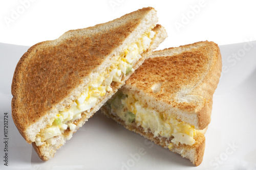 two slices of egg salad sandwich