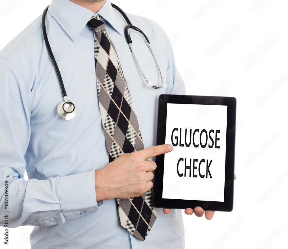 Doctor holding tablet - Glucose check Doctor holding tablet - Glucose check