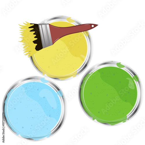 Three cans of paint and a brush, a top view.Paint can and paintb