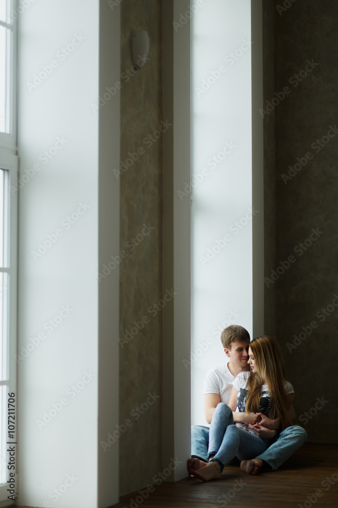 romantic happy young couple relax at modern home indoors romantic happy young couple relax at modern home indoors