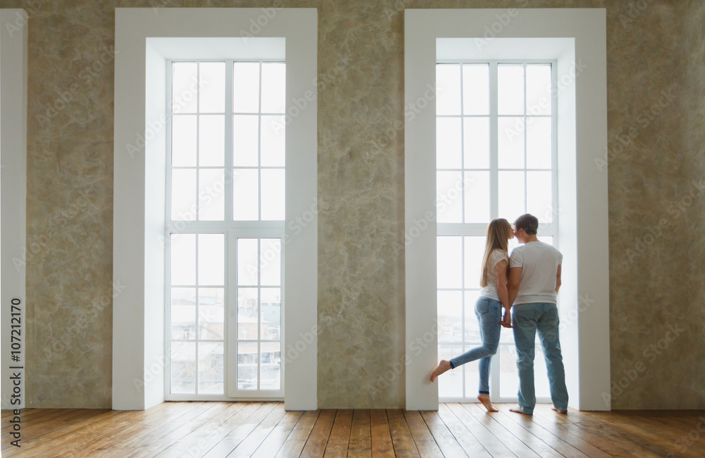 romantic happy young couple relax at modern home indoors romantic happy young couple relax at modern home indoors