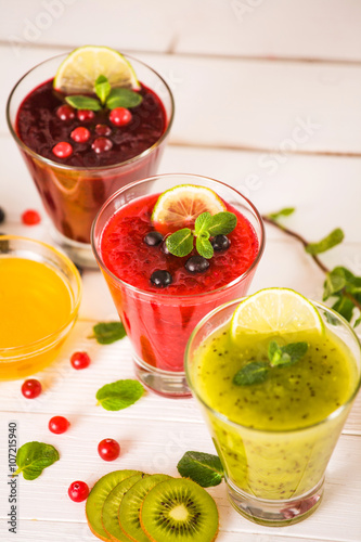 fresh berry smoothies, fruit shake with ingredients. healthy veggie food. no sugar, diet and detox concept.