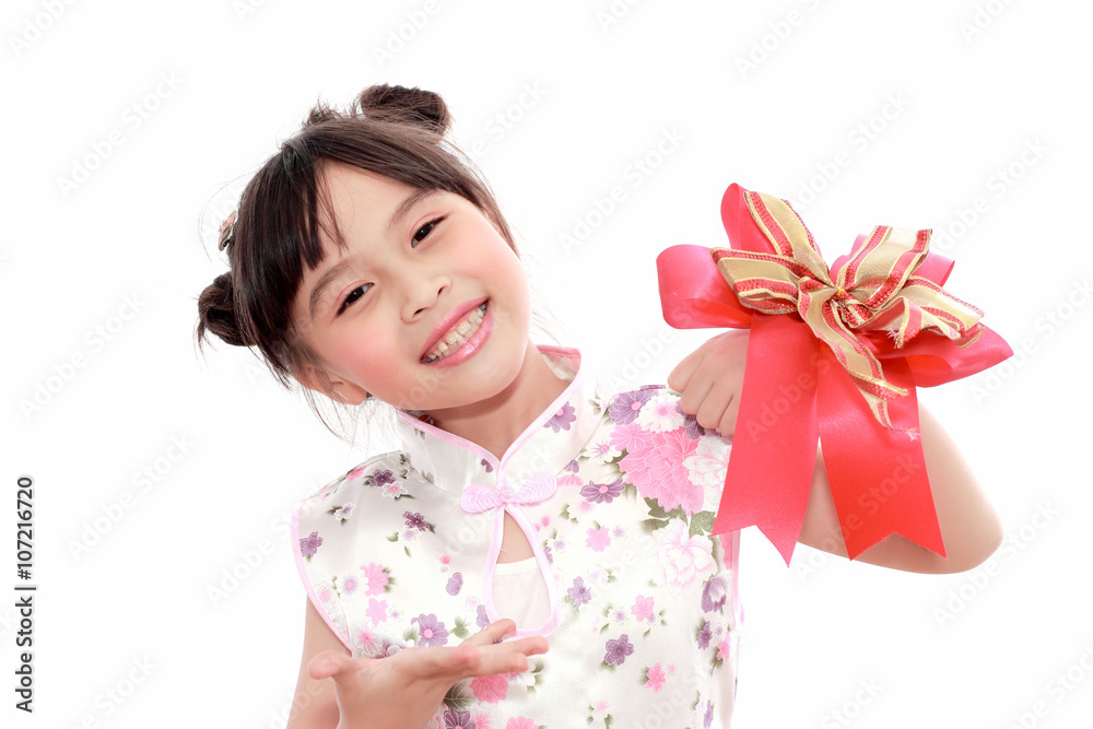 Adorable Chinese little girl holding red bag(hongbao or angbao) Adorable Chinese little girl holding red bag(hongbao or angbao)