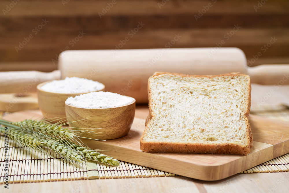 sliced bread on wooden table sliced bread on wooden table