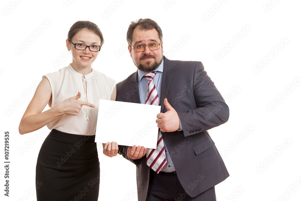 the woman and the man hold a sheet of paper the woman and the man hold a sheet of paper