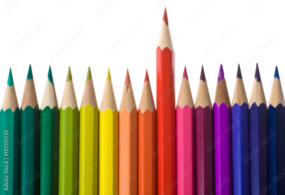 colored pencil in a line composition set with red over isolated on white colored pencil in a line composition set with red over isolated on white