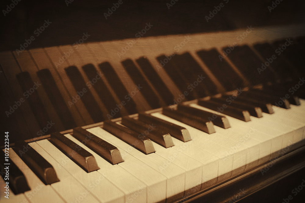 Closeup of piano keys and wood grain with sepia Closeup of piano keys and wood grain with sepia