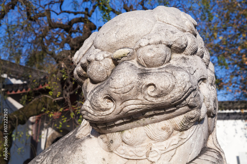 Ancient Chinese lion statue made of stone