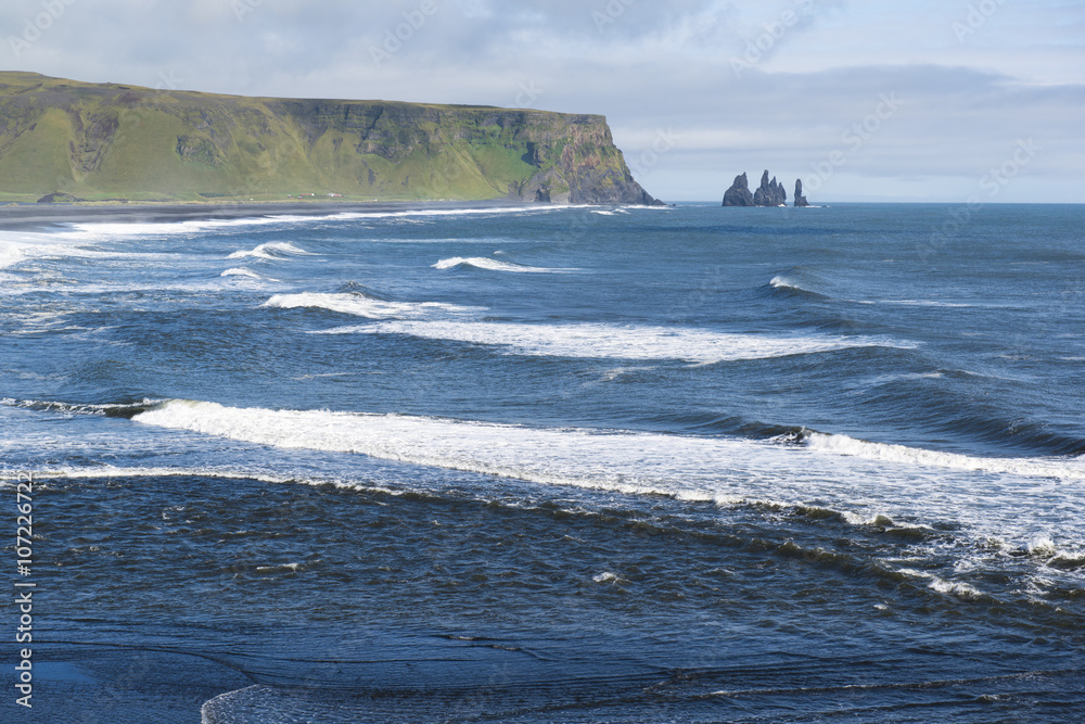 Atlantic coast landscape from Dyrholaey view point, waves and Reynisdrangar rocks, South Iceland
