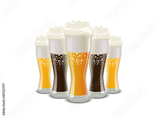 Many glasses of light and dark beer with foam on white
