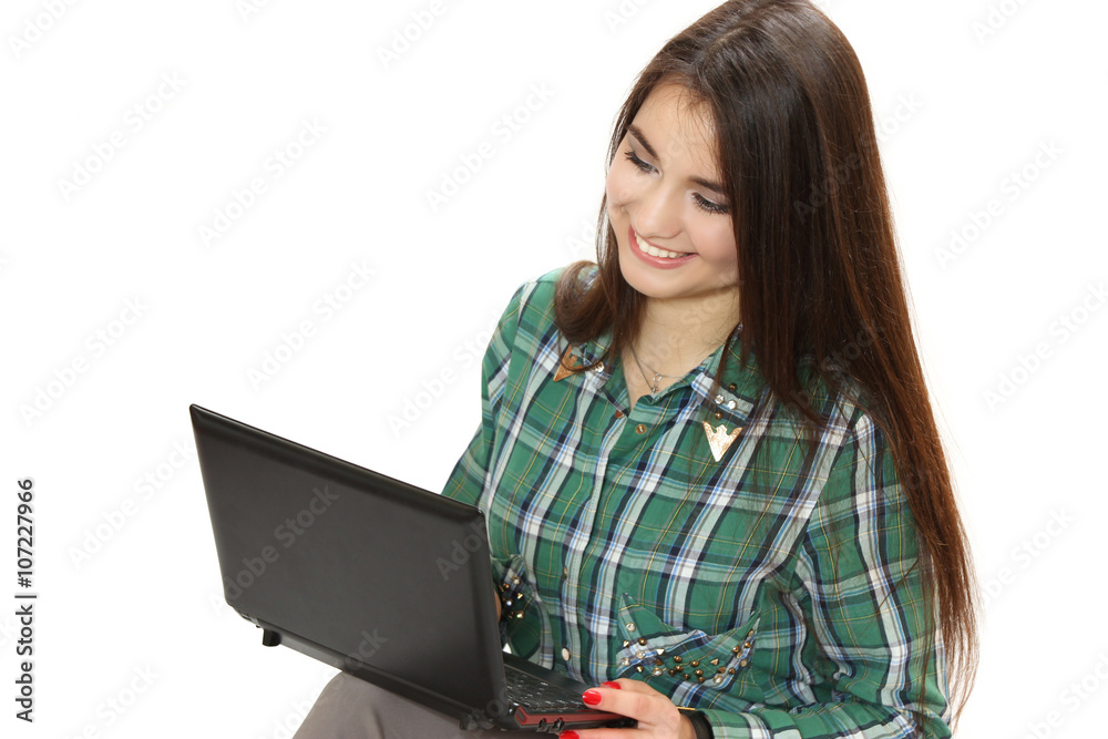 Naklejka premium nice young girl with the netbook.