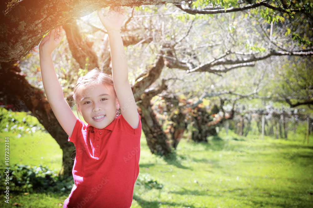 Little girl with green nature background Little girl with green nature background