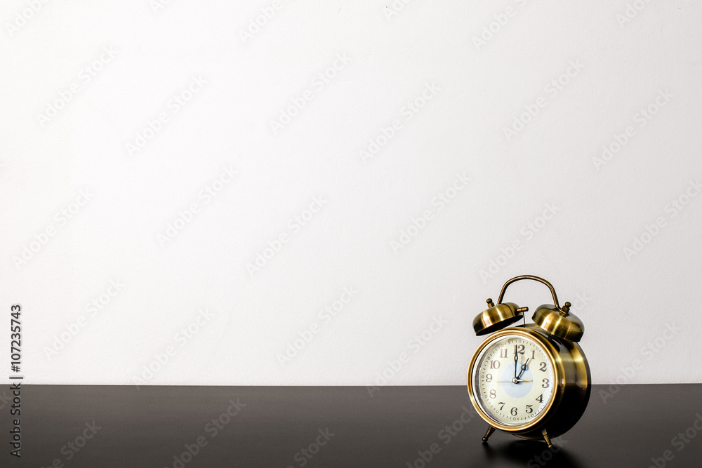 Retro alarm clock on table Retro alarm clock on table