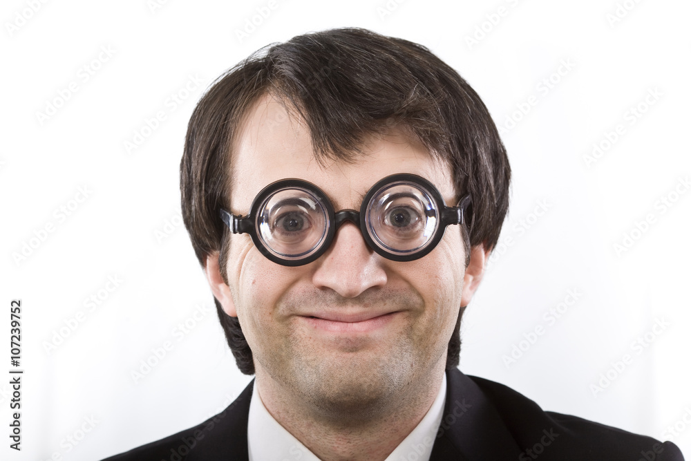 smiling nerd businessman with glasses isolated on white smiling nerd businessman with glasses isolated on white