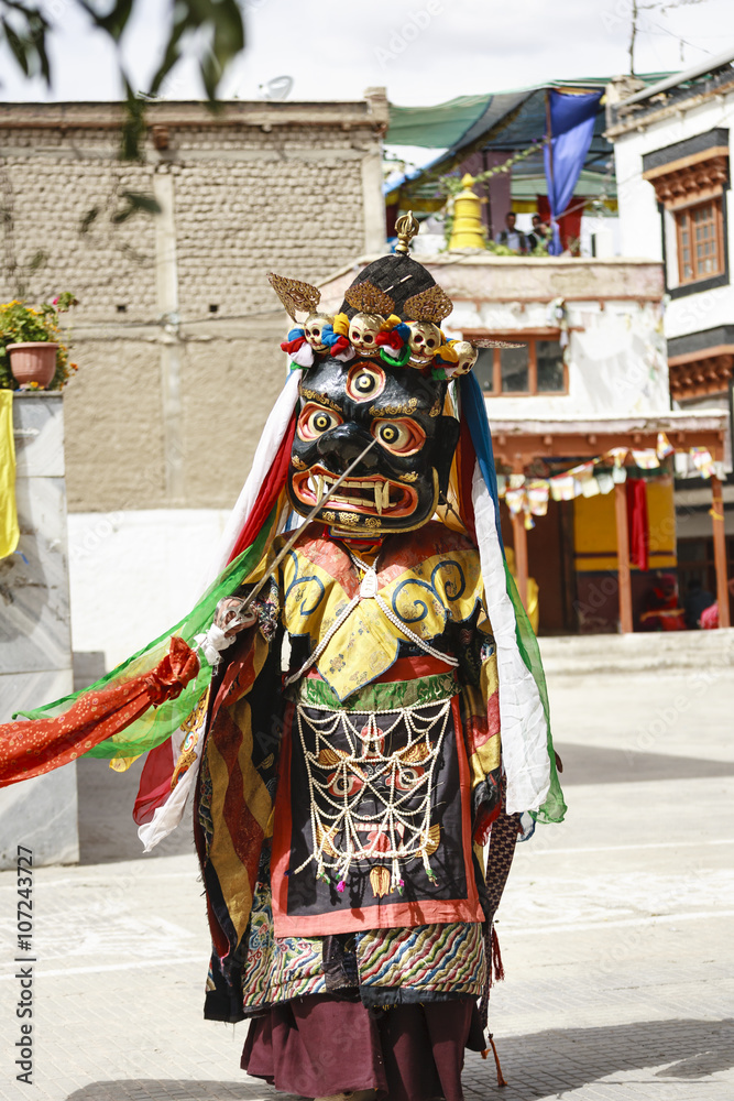 An unidentified buddhist lamas dressed in mystical mask dancing Tsam mystery dance in time of Yuru Kabgyat Buddhist festival at Lamayuru Gompa