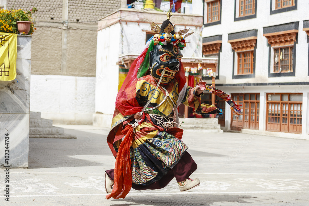 An unidentified buddhist lamas dressed in mystical mask dancing Tsam mystery dance in time of Yuru Kabgyat Buddhist festival at Lamayuru Gompa, Ladakh, North India