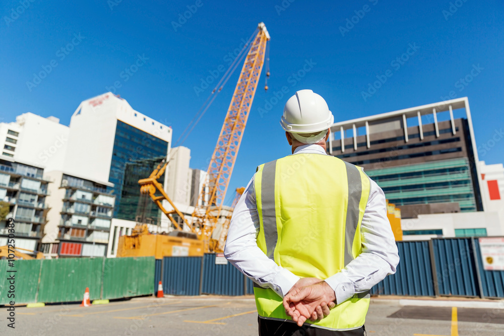 Engineer builder at construction site Engineer builder at construction site