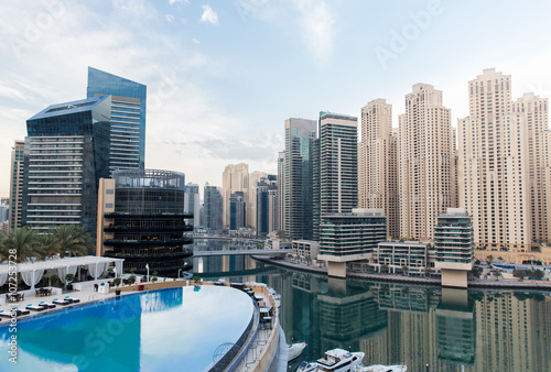 Dubai city seafront with hotel infinity edge pool © Syda Productions