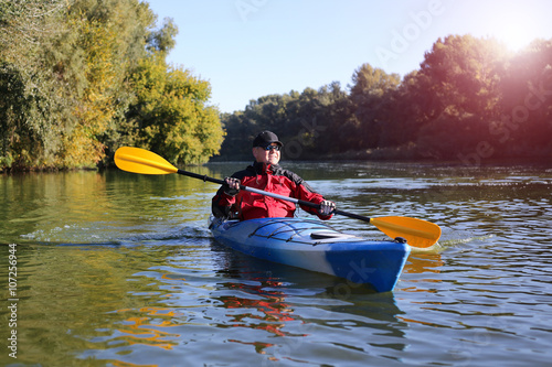 Photography Travel on the river in a kayak on a sunny day.