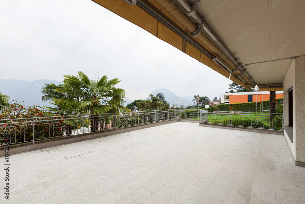 Fototapeta premium Exterior of modern apartment wide balcony