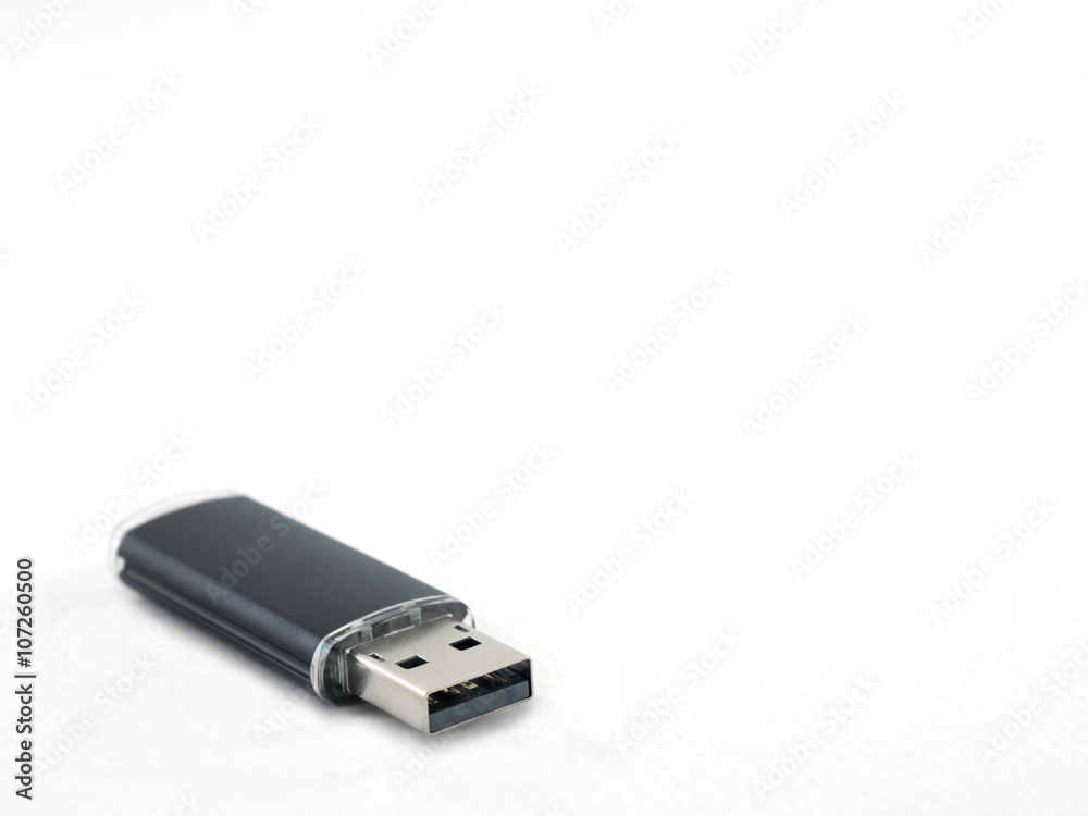 Black UBS flash drive isolate on white background with space for text. Black UBS flash drive isolate on white background with space for text.