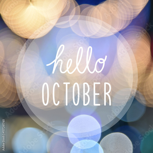 Hello October greeting on bokeh lights