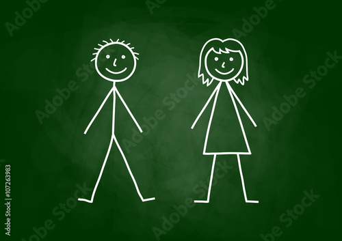 Children drawing on blackboard