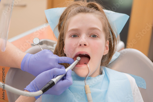 Young girl at dentist.  dental treatment    