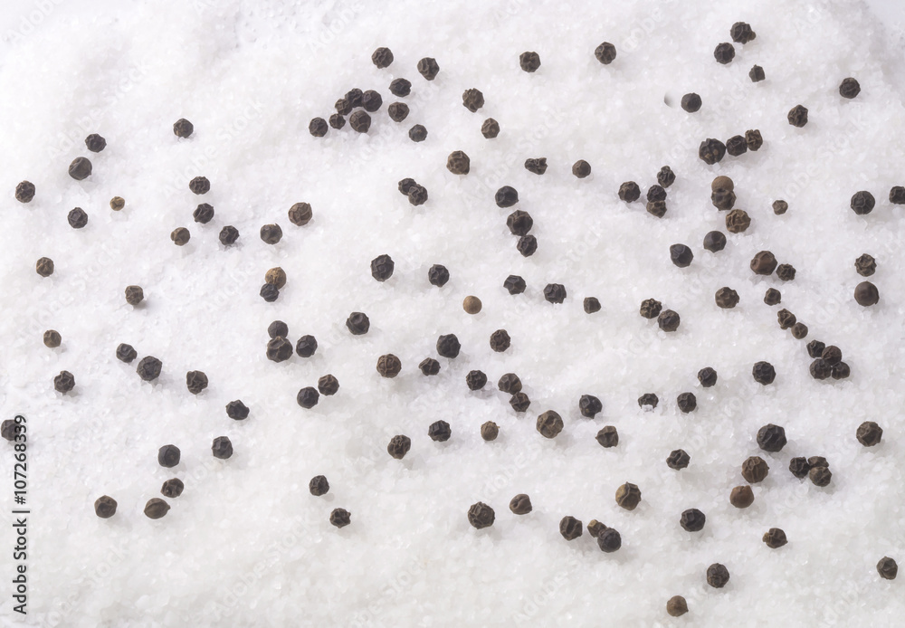 a mixture of sea salt pepper peas black top view a mixture of sea salt pepper peas black top view