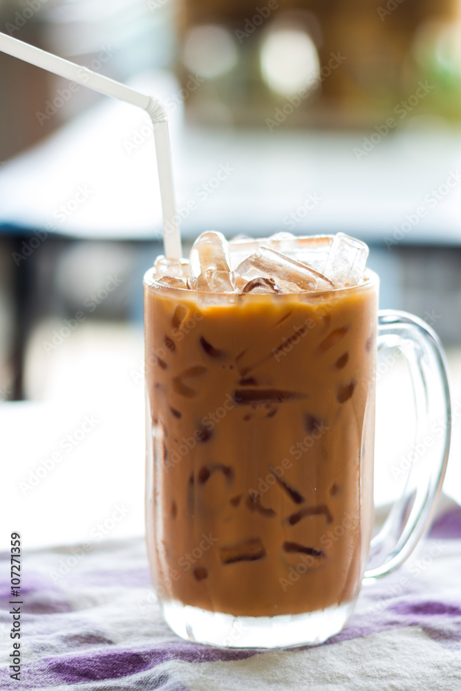 iced tea with milk in glass. iced tea with milk in glass.