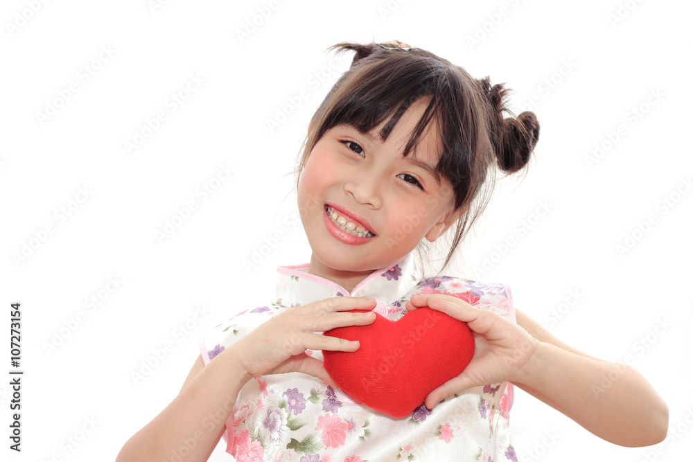 Adorable Chinese little girl holding red heart Adorable Chinese little girl holding red heart