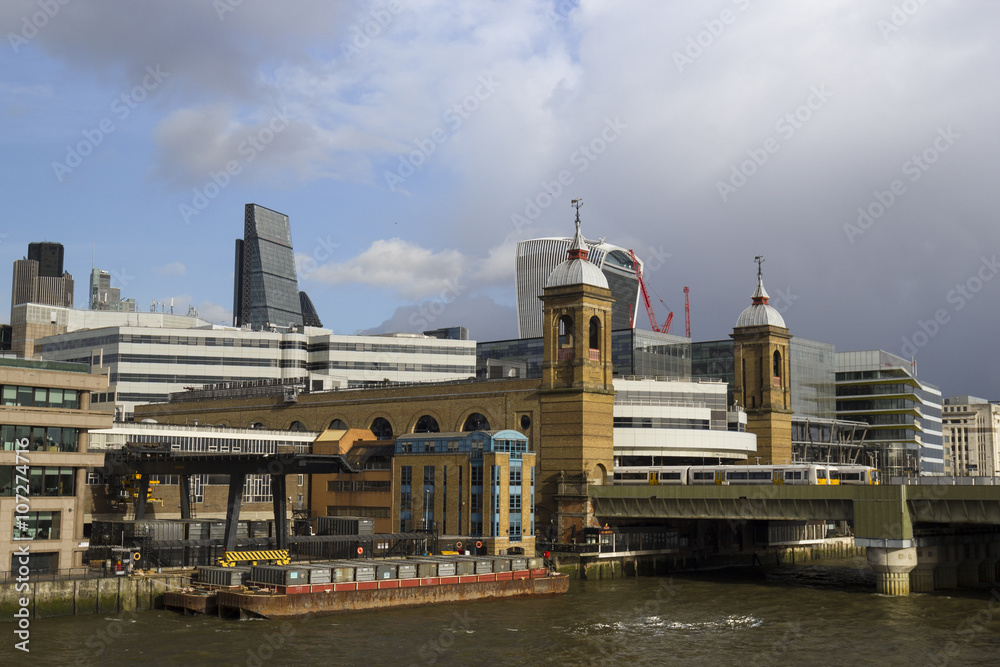 Fototapeta premium London City Skyline with Millennium bridge and construction cranes