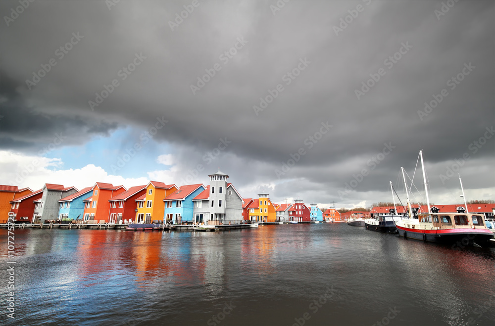 colorful buildings on water in haven