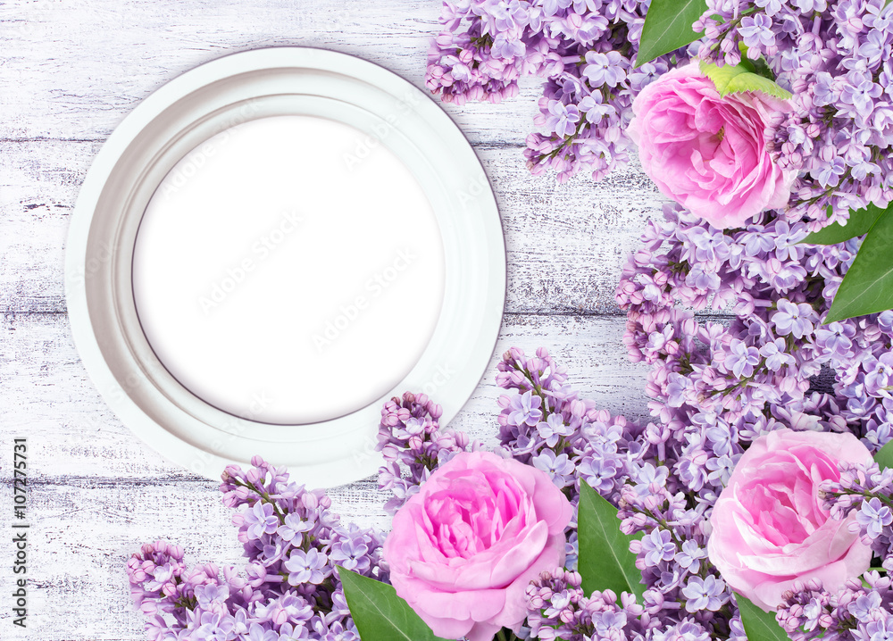 Lilac flowers with roses and photo frame Lilac flowers with roses and photo frame
