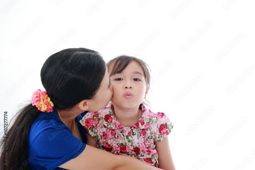 Close Up Of Affectionate Mother And Daughter on white isolated b Close Up Of Affectionate Mother And Daughter on white isolated b